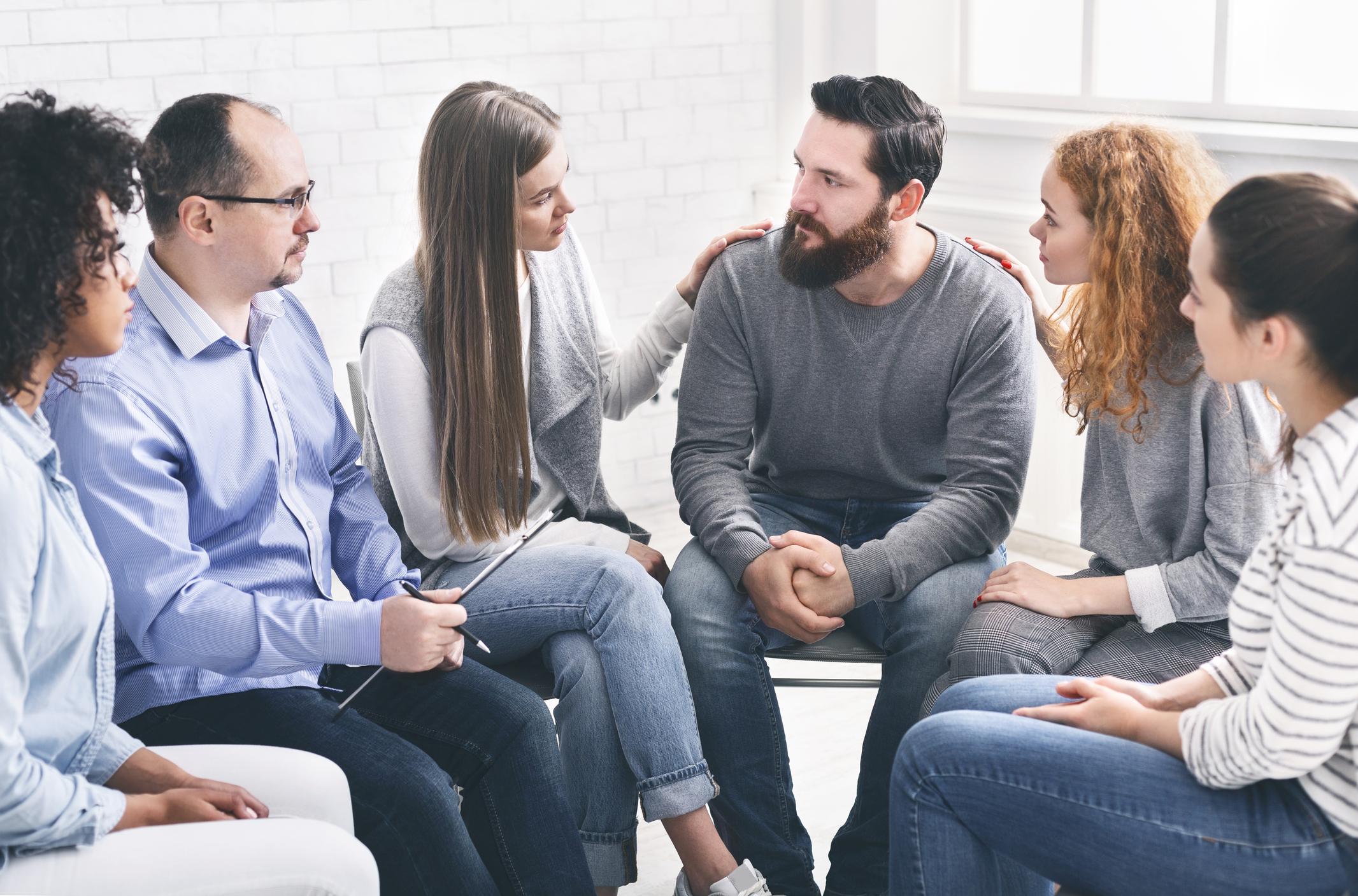 Facilitated sharing circle — trauma-informed, small-group environment in Europe