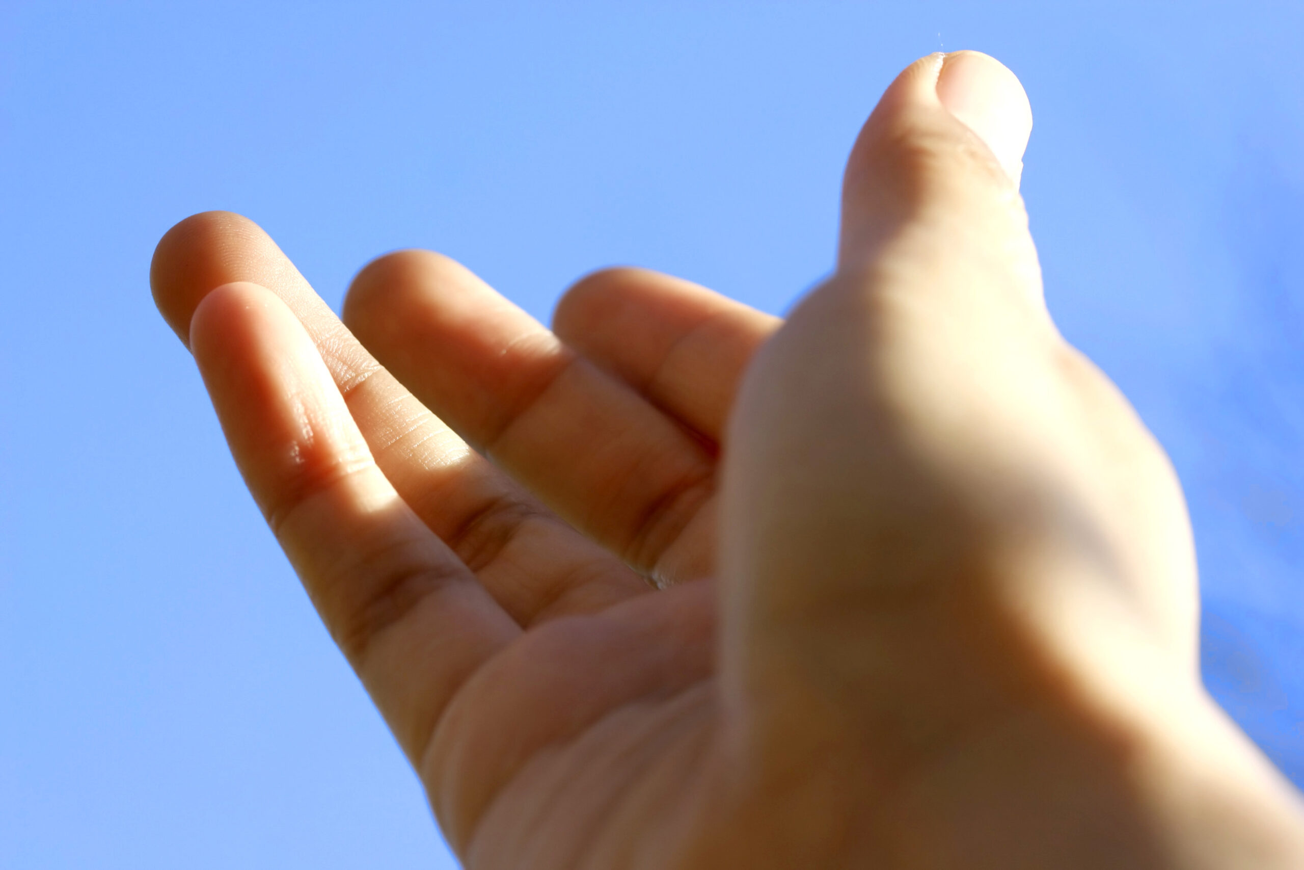 Welcoming hand gesture — invitation into a safe, premium retreat
